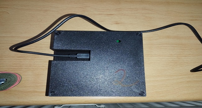 Button Domination Timer from the back view - visible display contrast control cutout